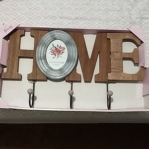 Rustic home sign with hooks